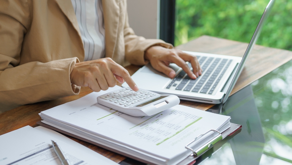 tax-documents-calculator-desk IRS penalty insights for Tampa taxpayers by Hacker, Johnson & Smith PA